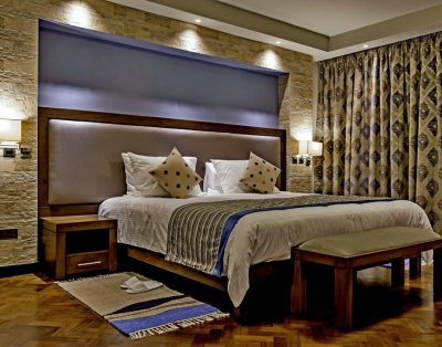 Magna Hotel and Suites